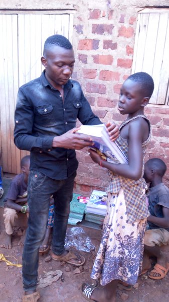 Giving out books 