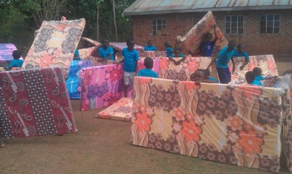 My babies in Africa got their mattresses!!! 