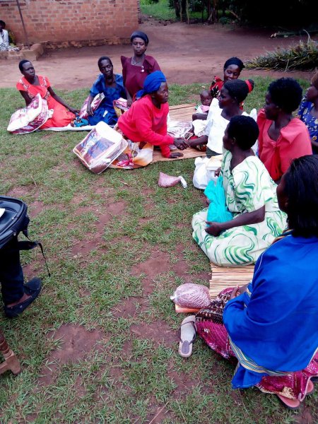 Widows receiving seeds, blankets & bibles