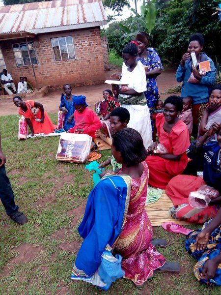 Widows receiving seeds, blankets & bibles