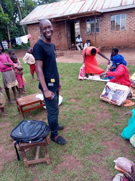 Widows receiving seeds, blankets & bibles