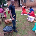 Widows receiving seeds, blankets & bibles