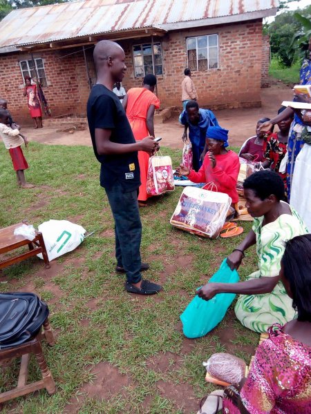 Widows receiving seeds, blankets & bibles