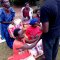 Widows receiving seeds, blankets & bibles