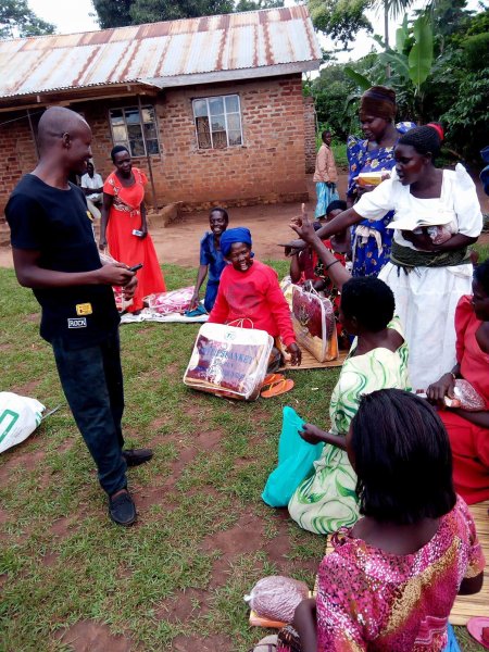 Widows receiving seeds, blankets & bibles