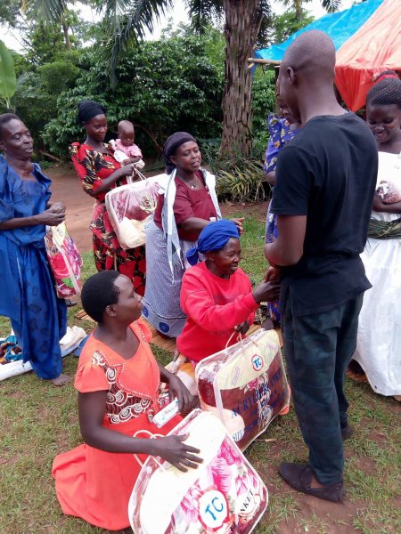 Widows receiving seeds, blankets & bibles