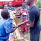 Widows receiving seeds, blankets & bibles