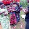 Widows receiving seeds, blankets & bibles