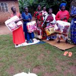 Widows receiving seeds, blankets & bibles