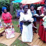 Widows receiving seeds, blankets & bibles