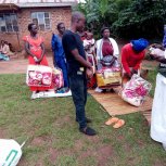 Widows receiving seeds, blankets & bibles