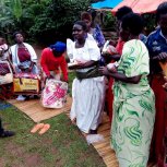 Widows receiving seeds, blankets & bibles