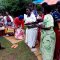 Widows receiving seeds, blankets & bibles