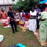 Widows receiving seeds, blankets & bibles