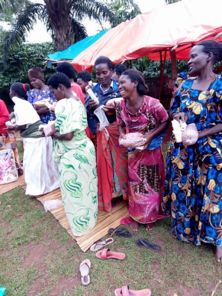 Widows receiving seeds, blankets & bibles