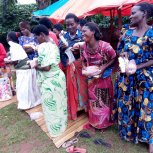 Widows receiving seeds, blankets & bibles