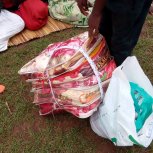 Widows receiving seeds, blankets & bibles