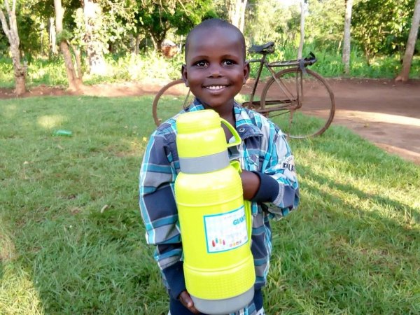 Proud of his new thermos!