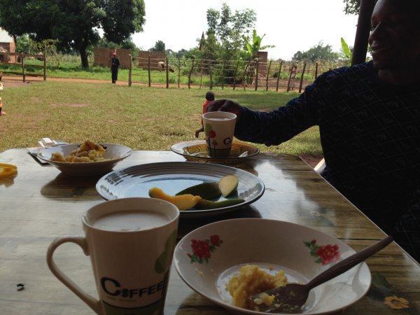 Breakfast porridge, mango and omelette 