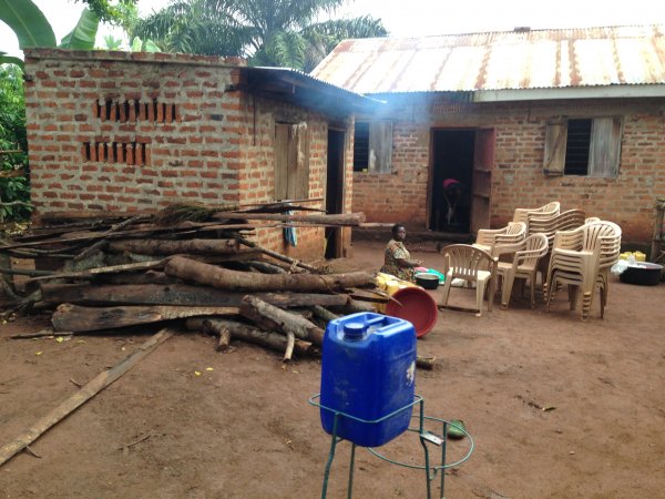 view of back of orphanage with kitchen and eating area