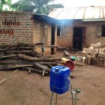 view of back of orphanage with kitchen and eating area