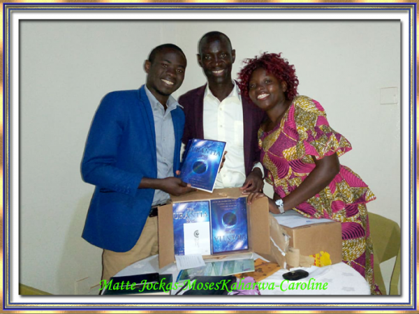 Matte Jockas receiving his Urantia Book at the first Urantia Uganda August 2020 Planning Committee Meeting on Sept 5th 2019