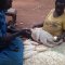 Grandma & Aunt shucking corn