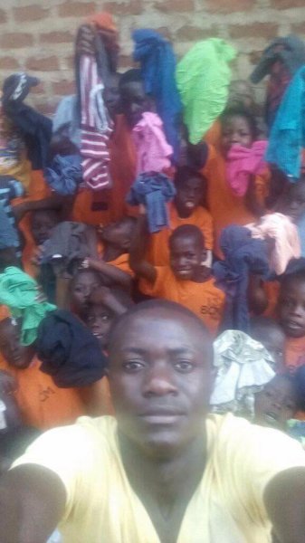 Children receive T Shirts at Butiiki Children's Ministry 