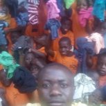 Children receive T Shirts at Butiiki Children's Ministry 