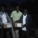 2020-11-15 Uganda Book Deliveries Bishop Moses Kaharwa and Pastor Caroline