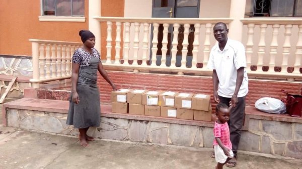 2020-11-15 Uganda Book Deliveries Bishop Moses Kaharwa and Pastor Caroline