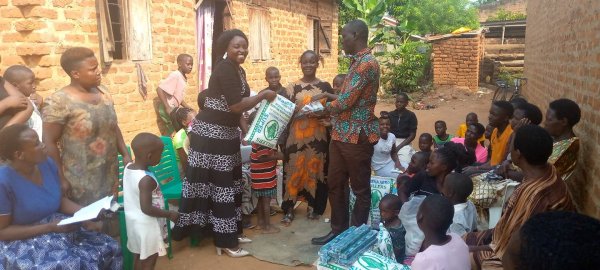 Pastor Caroline Christmas Giving made possible by a generous donor to SFN 2021-12-26 Community of Kaliro Town Council
