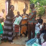 Pastor Caroline Christmas Giving made possible by a generous donor to SFN 2021-12-26 Community of Kaliro Town Council