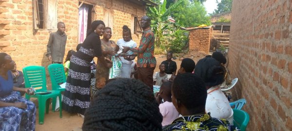 Pastor Caroline Christmas Giving made possible by a generous donor to SFN 2021-12-26 Community of Kaliro Town Council