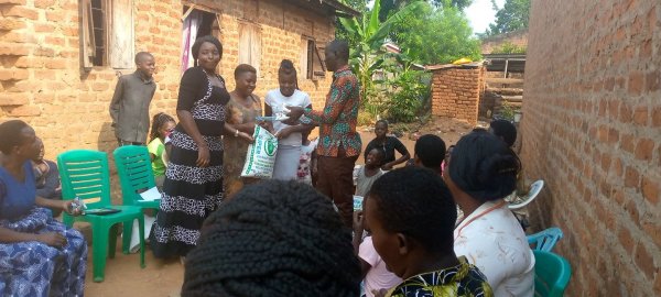 Pastor Caroline Christmas Giving made possible by a generous donor to SFN 2021-12-26 Community of Kaliro Town Council