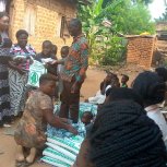 Pastor Caroline Christmas Giving made possible by a generous donor to SFN 2021-12-26 Community of Kaliro Town Council
