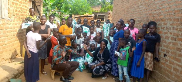 Pastor Caroline Christmas Giving made possible by a generous donor to SFN 2021-12-26 Community of Kaliro Town Council