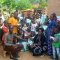 Pastor Caroline Christmas Giving made possible by a generous donor to SFN 2021-12-26 Community of Kaliro Town Council