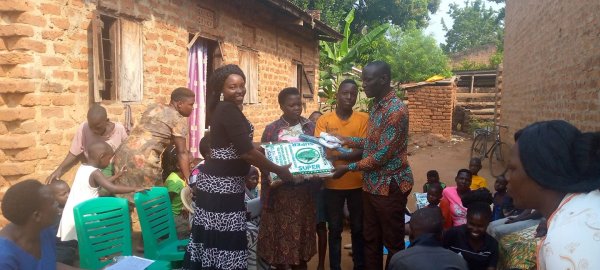 Pastor Caroline Christmas Giving made possible by a generous donor to SFN 2021-12-26 Community of Kaliro Town Council