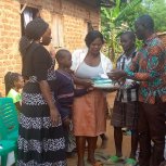 Pastor Caroline Christmas Giving made possible by a generous donor to SFN 2021-12-26 Community of Kaliro Town Council