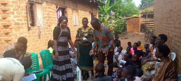 Pastor Caroline Christmas Giving made possible by a generous donor to SFN 2021-12-26 Community of Kaliro Town Council &amp; SEETA-MUKONO