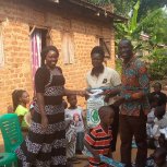 Pastor Caroline Christmas Giving made possible by a generous donor to SFN 2021-12-26 Community of Kaliro Town Council &amp; SEETA-MUKONO
