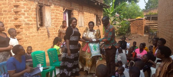 Pastor Caroline Christmas Giving made possible by a generous donor to SFN 2021-12-26 Community of Kaliro Town Council &amp; SEETA-MUKONO