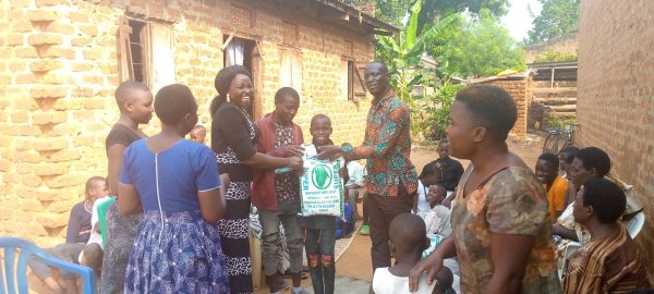 Pastor Caroline Christmas Giving made possible by a generous donor to SFN 2021-12-26 Community of Kaliro Town Council &amp; SEETA-MUKONO