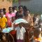 Pastor Caroline Christmas Giving made possible by a generous donor to SFN 2021-12-26 Community of Kaliro Town Council &amp; SEETA-MUKONO