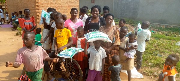 Pastor Caroline Christmas Giving made possible by a generous donor to SFN 2021-12-26 Community of Kaliro Town Council &amp; SEETA-MUKONO