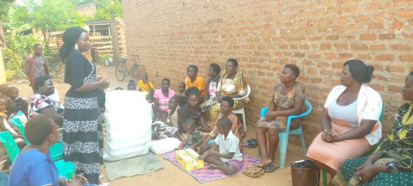 Pastor Caroline Christmas Giving made possible by a generous donor to SFN 2021-12-26 Community of Kaliro Town Council &amp; SEETA-MUKONO