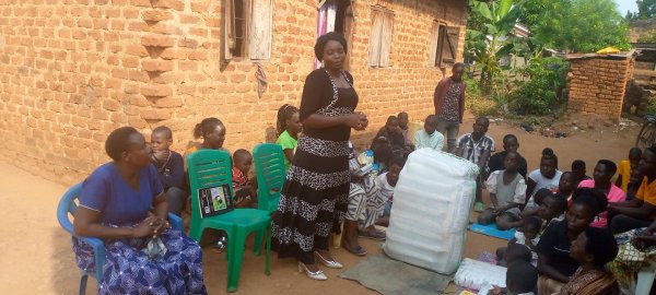 Pastor Caroline Christmas Giving made possible by a generous donor to SFN 2021-12-26 Community of Kaliro Town Council &amp; SEETA-MUKONO