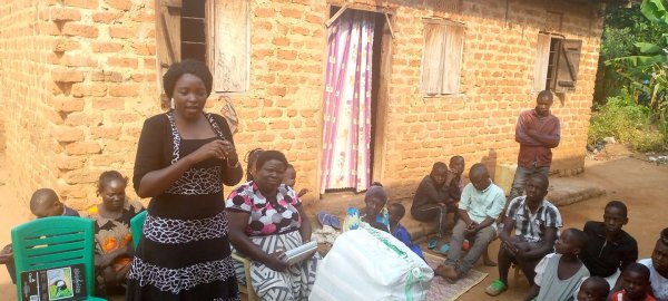 Pastor Caroline Christmas Giving made possible by a generous donor to SFN 2021-12-26 Community of Kaliro Town Council &amp; SEETA-MUKONO