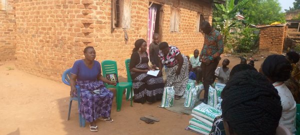 Pastor Caroline Christmas Giving made possible by a generous donor to SFN 2021-12-26 Community of Kaliro Town Council &amp; SEETA-MUKONO